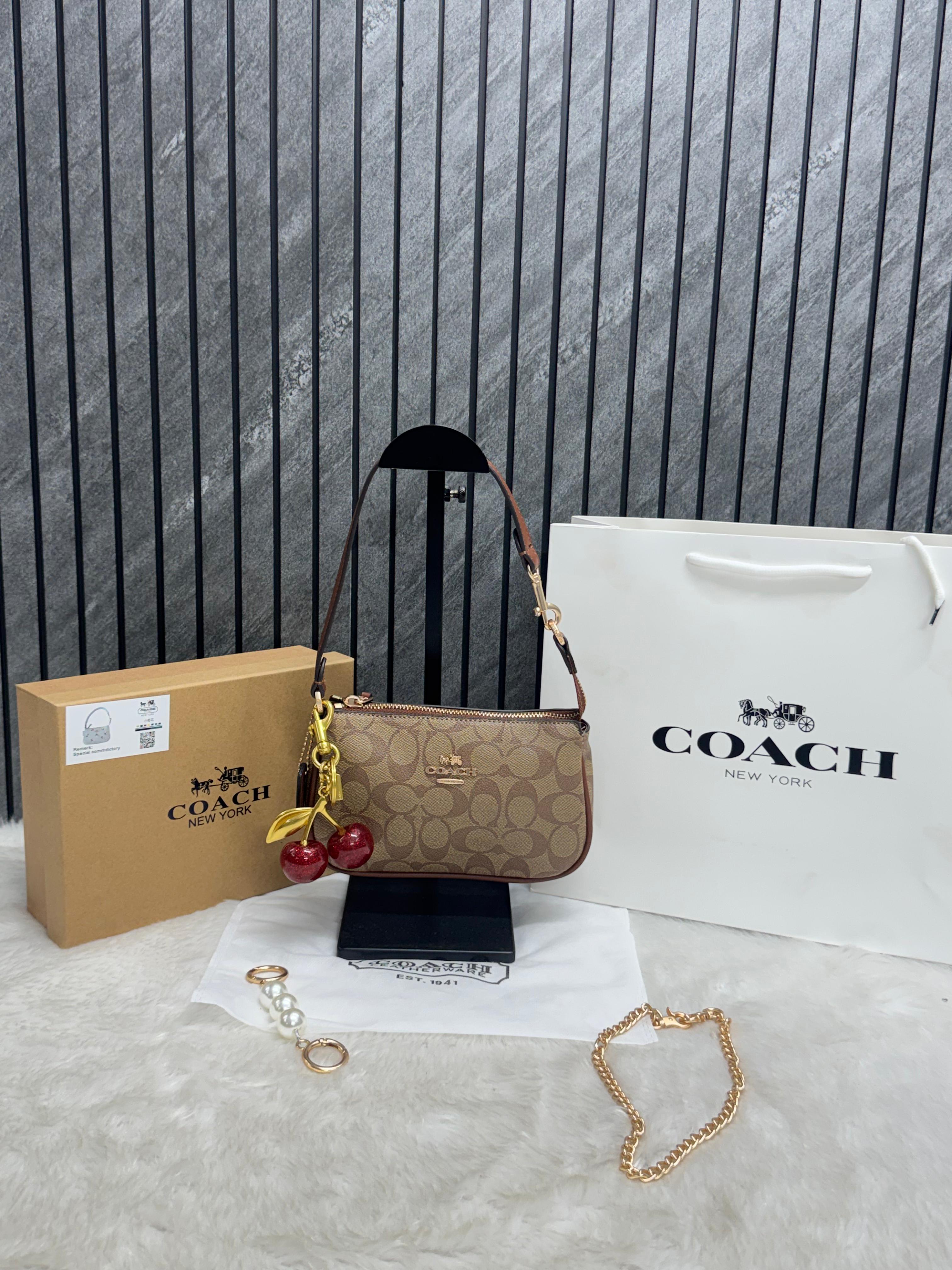 Coac_h Nolita 19 with Cherry Charm