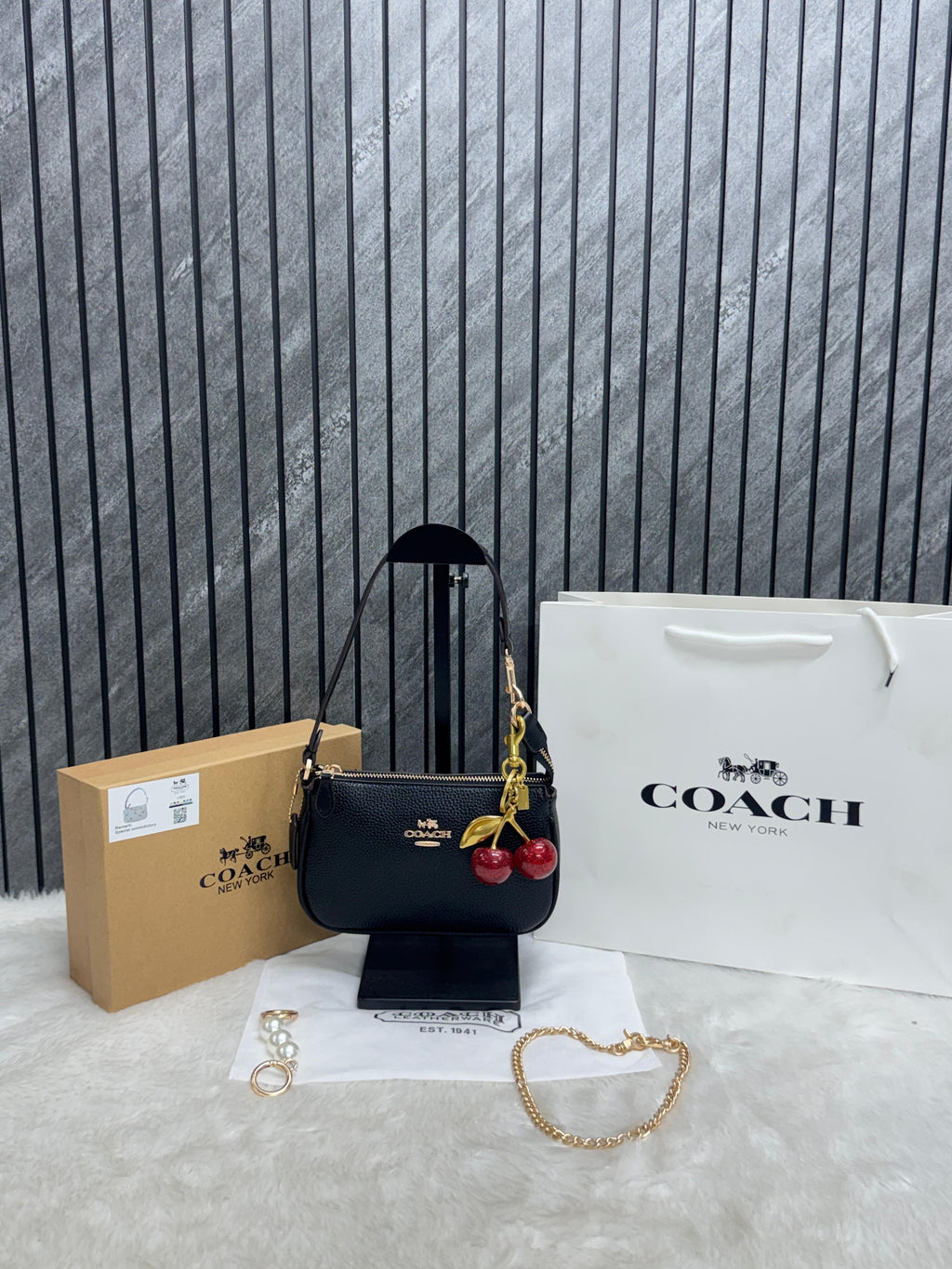 Coac_h Nolita 19 with Cherry Charm