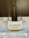 Coac_H teri mini crossbody bag in signature canvas with Coach graphic & original box