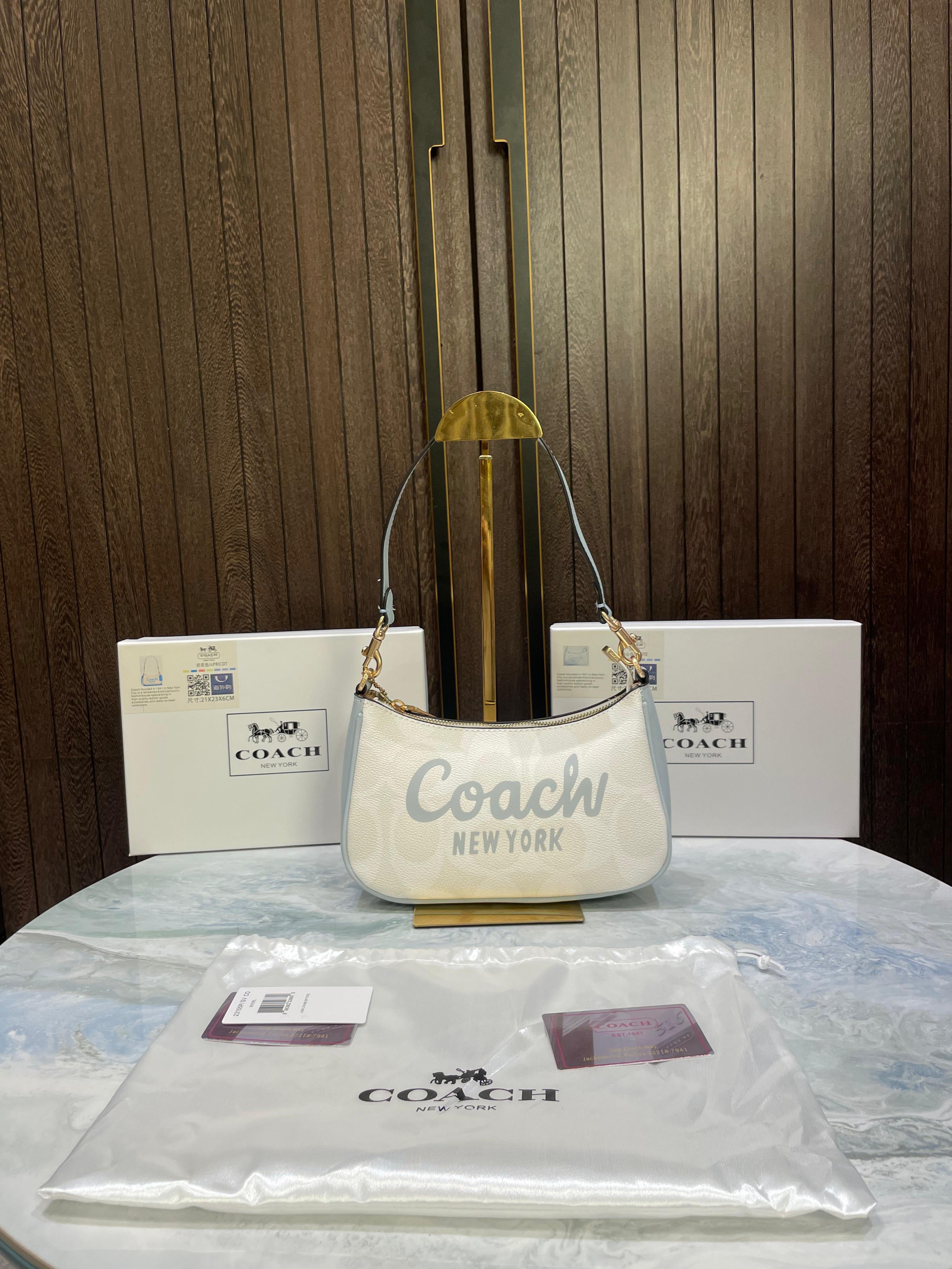 Coac_H teri mini crossbody bag in signature canvas with Coach graphic & original box